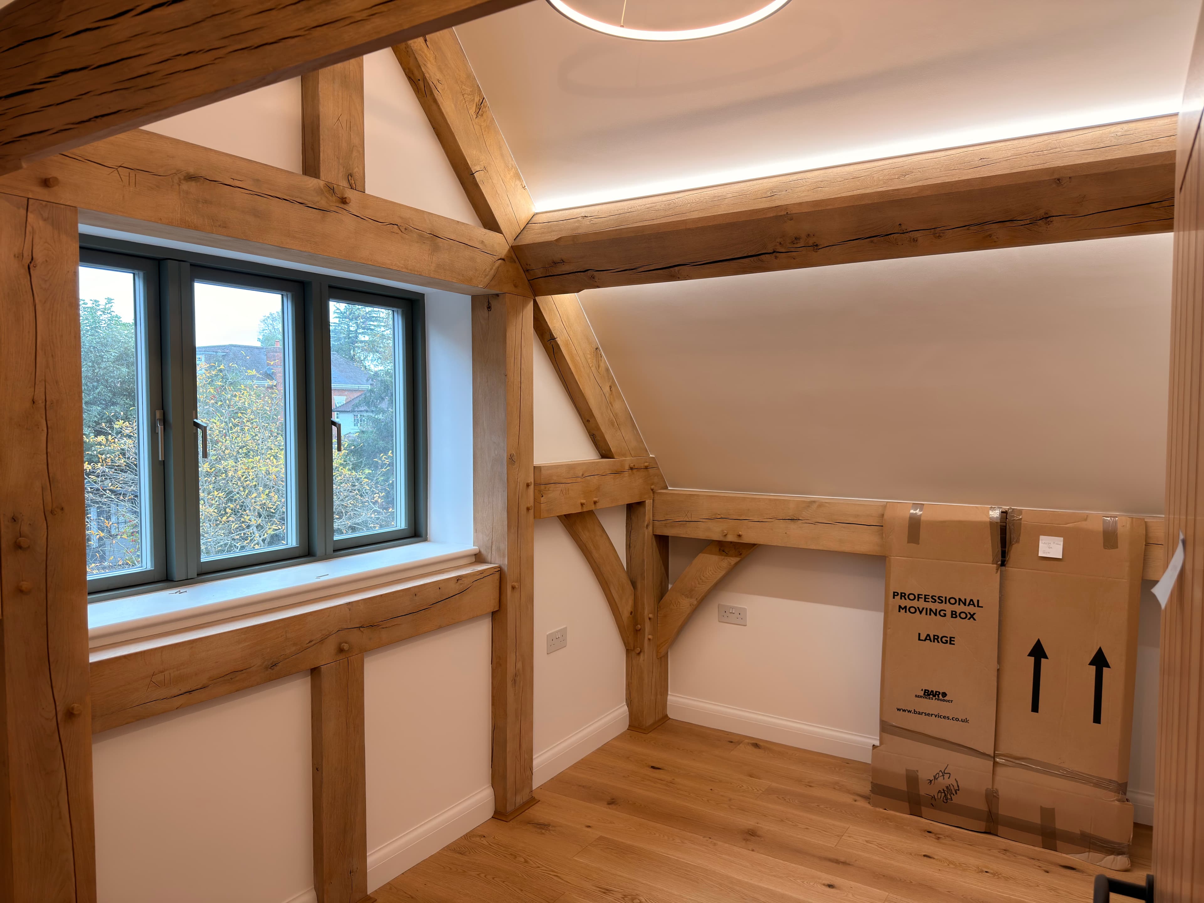 Exposed oak trusses and pegged joints